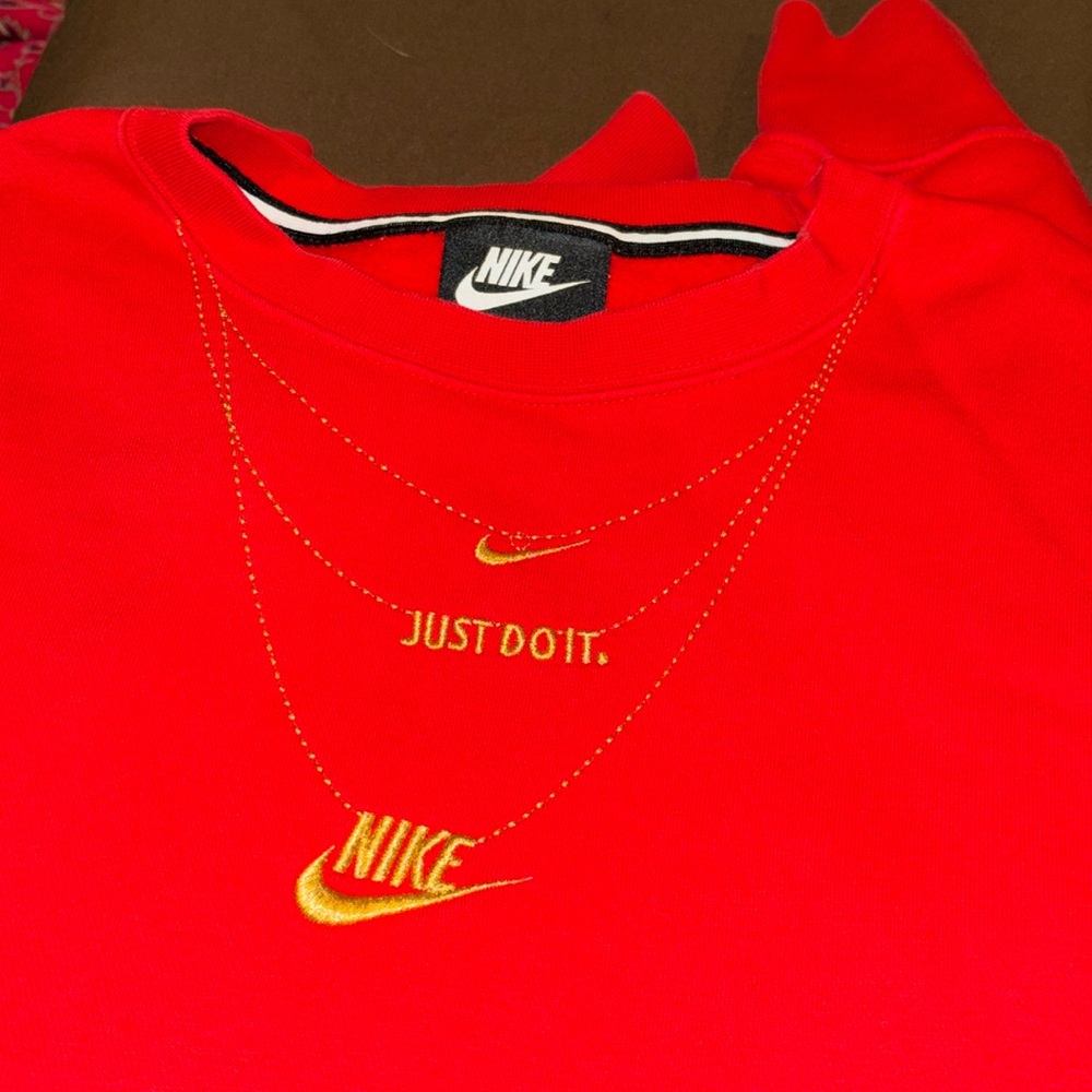 red Nike crewneck